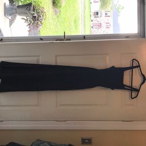 Black tie, open back dress